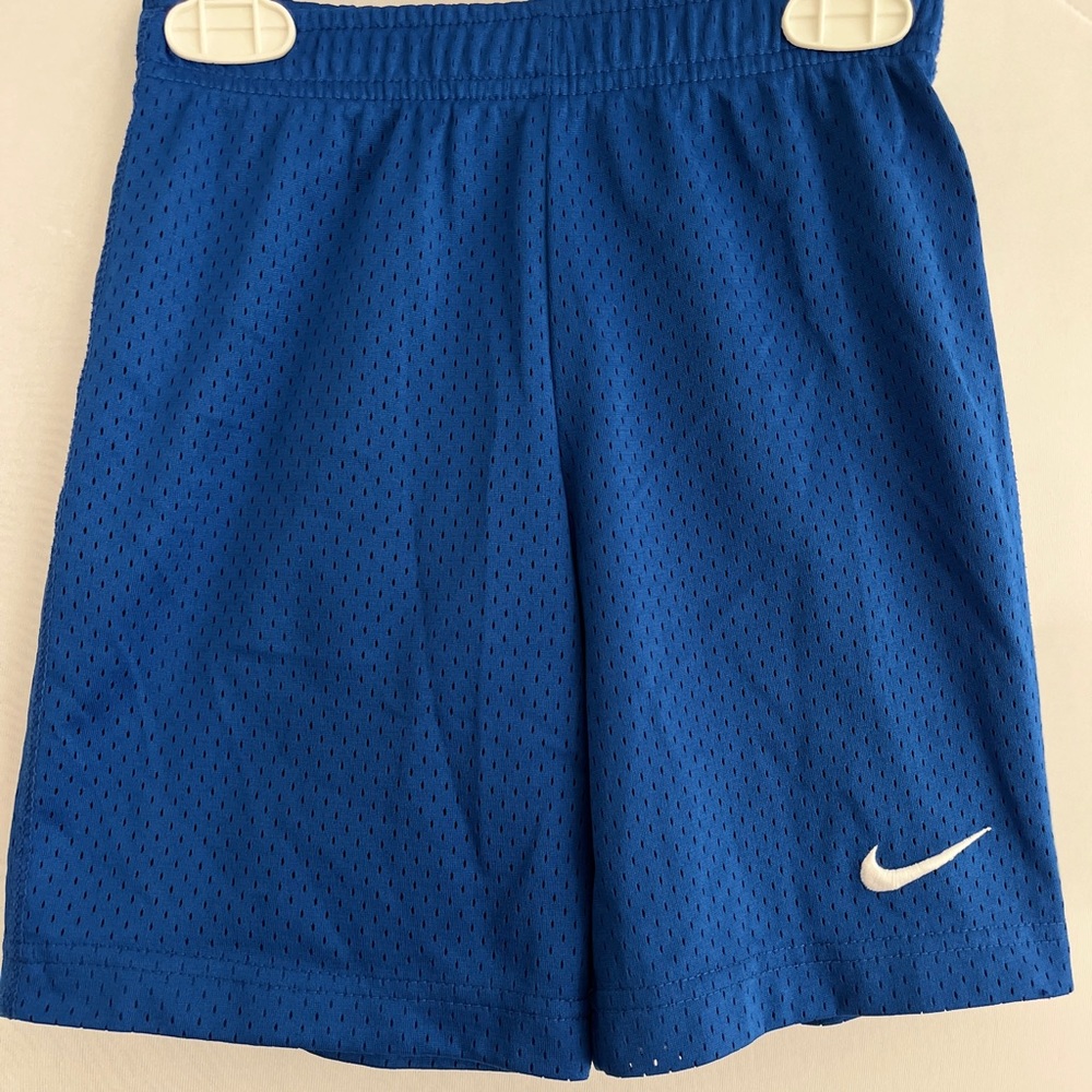 Nike brand boys athletic shorts in blue